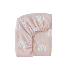 Meracorallo rainbow muslin fitted crib sheet shows a soft, breathable sleep surface for baby.