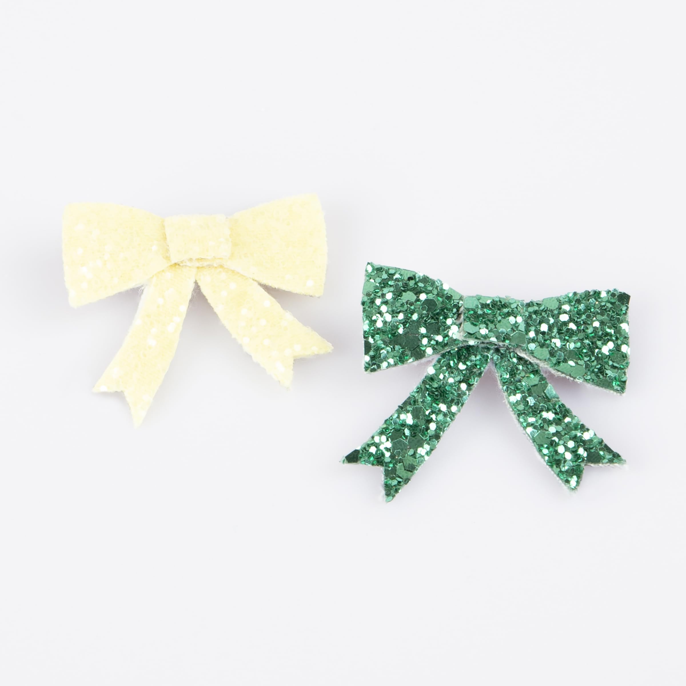 Meri Meri glitter bow hair clip in blue adds bold sparkle to any hairstyle
