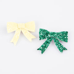 Meri Meri glitter bow hair clip in blue adds bold sparkle to any hairstyle