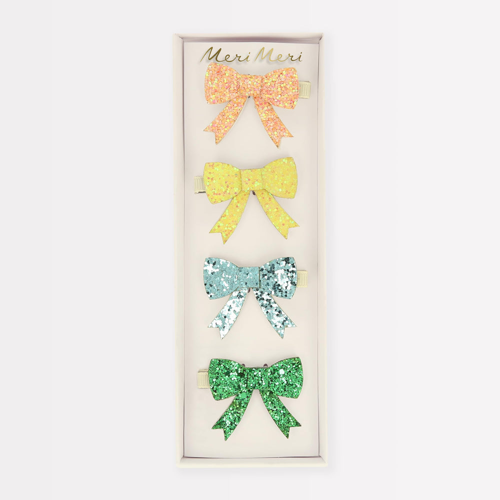 Meri Meri glitter bow hair clip close-up showcases chunky glitter texture