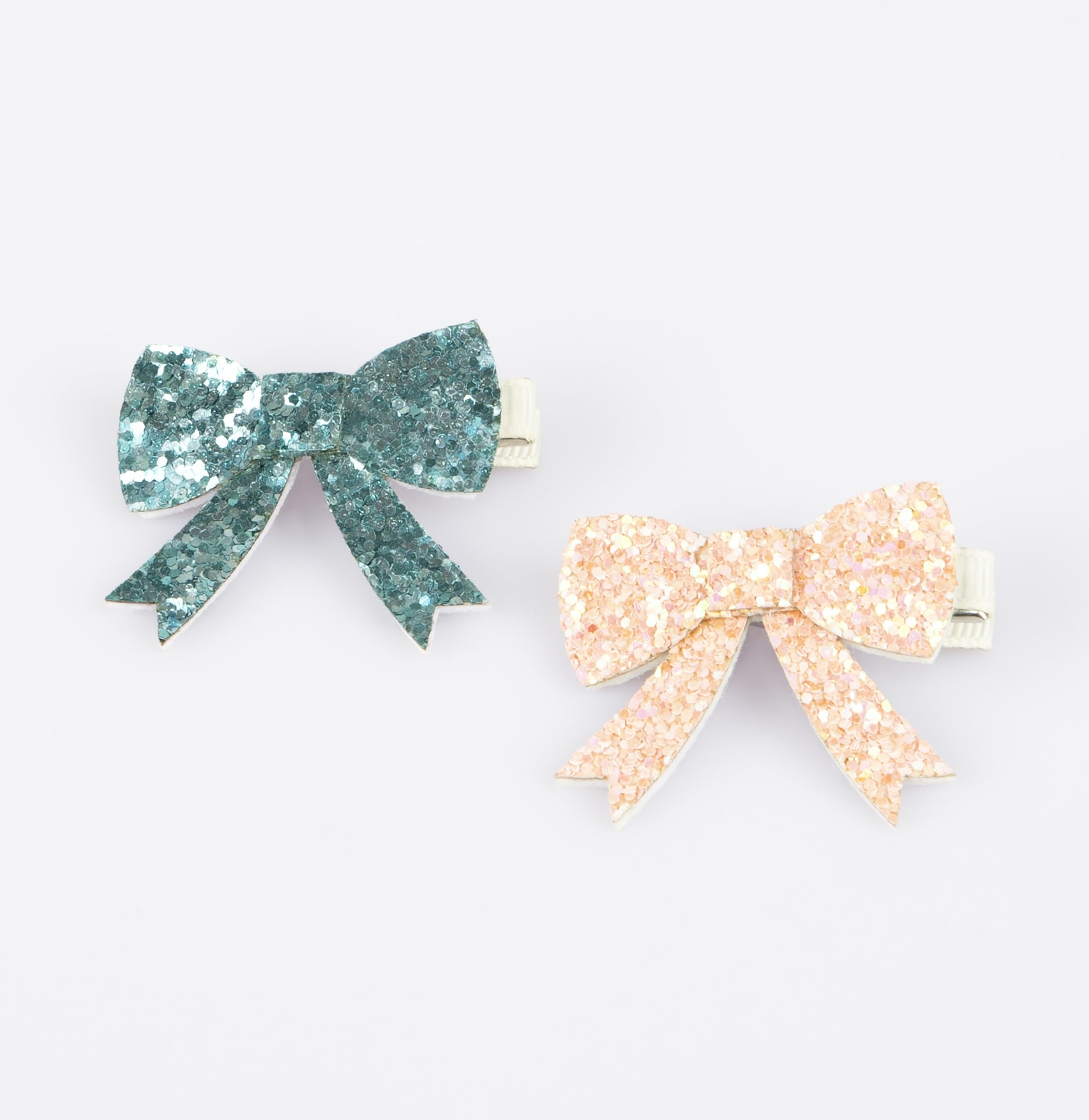 Meri Meri glitter bow hair clip in green adds fresh color to everyday wear