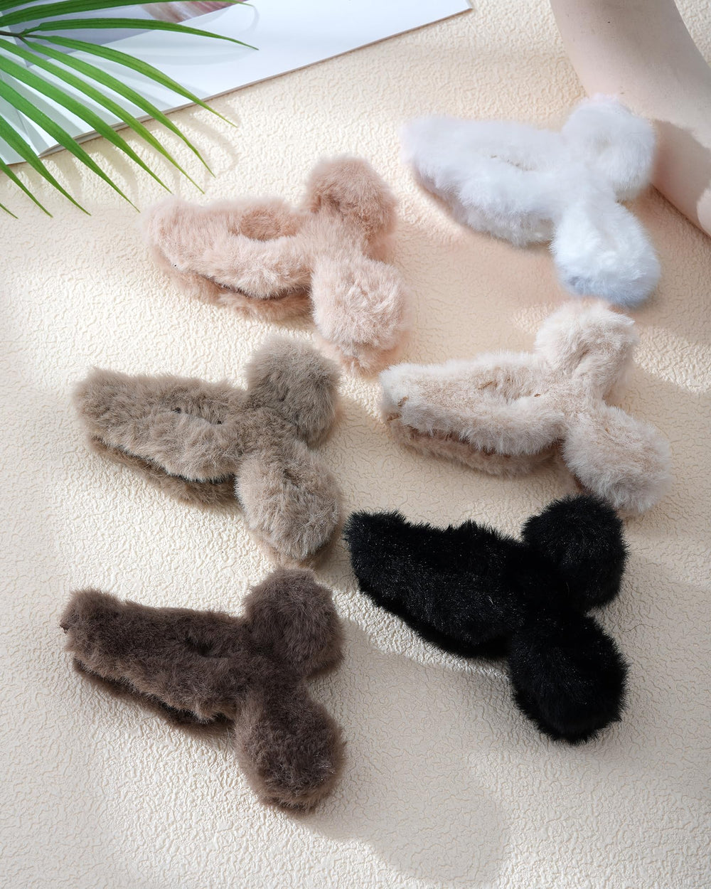 Mesovor secure-hold plush claw clip keeps hair neatly in place.