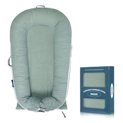 MEXXI baby nest replacement cover in corduroy sage green offers soft, breathable cotton for newborn comfort.