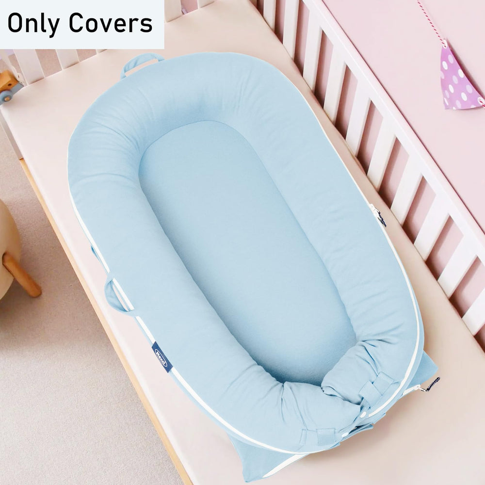 Mexxi baby blue cover supports tidy diaper changes with secure closures