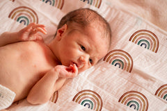 Gift-ready Miaoberry swaddle blanket in vibrant rainbow tones