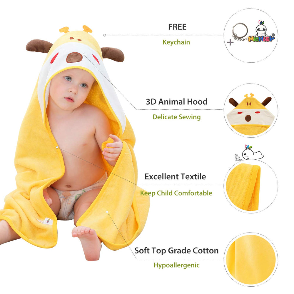 MICHLEY giraffe hooded towel on baby, emphasizing cozy warmth after bath time.