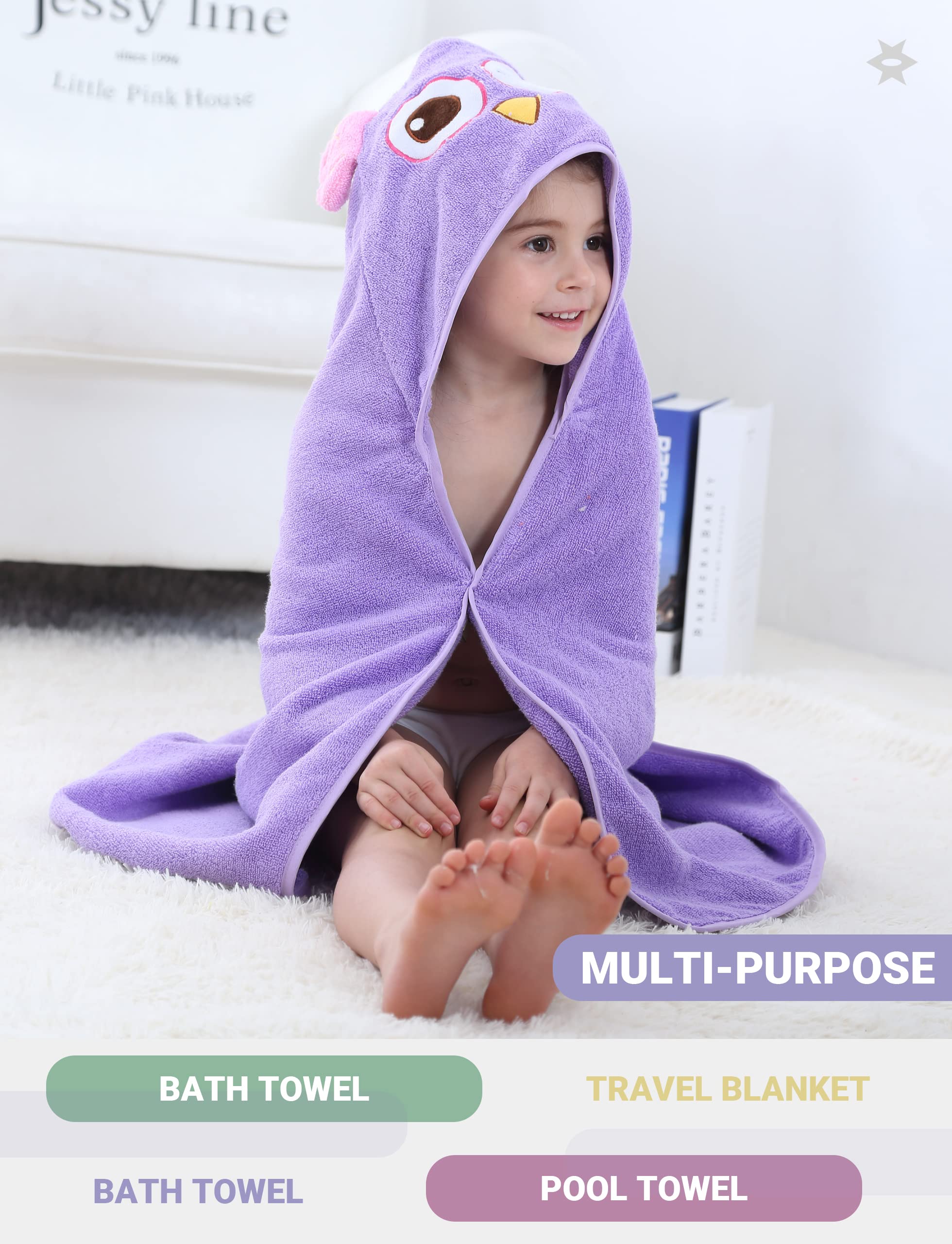 MICHLEY hooded towel wraps baby warmly after bath time.