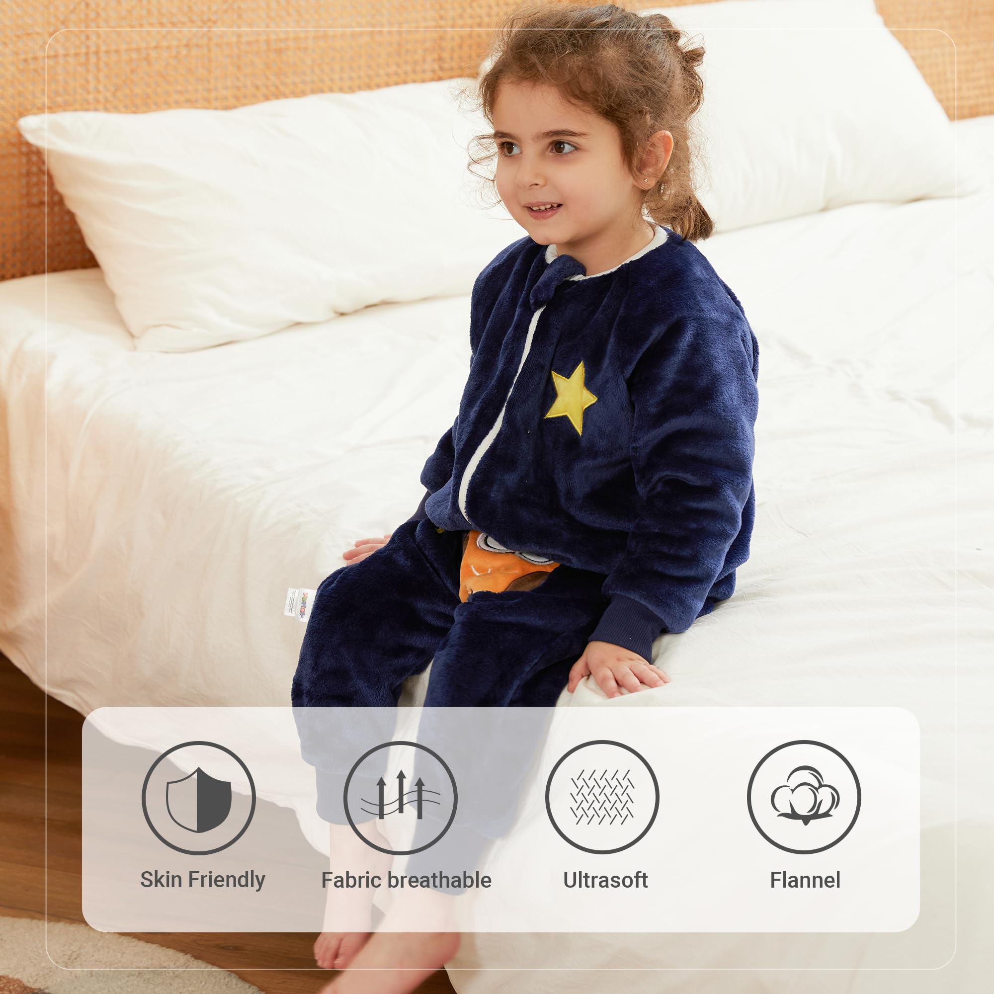 MICHLEY baby wearing the sleeping bag demonstrates leg mobility and comfort.