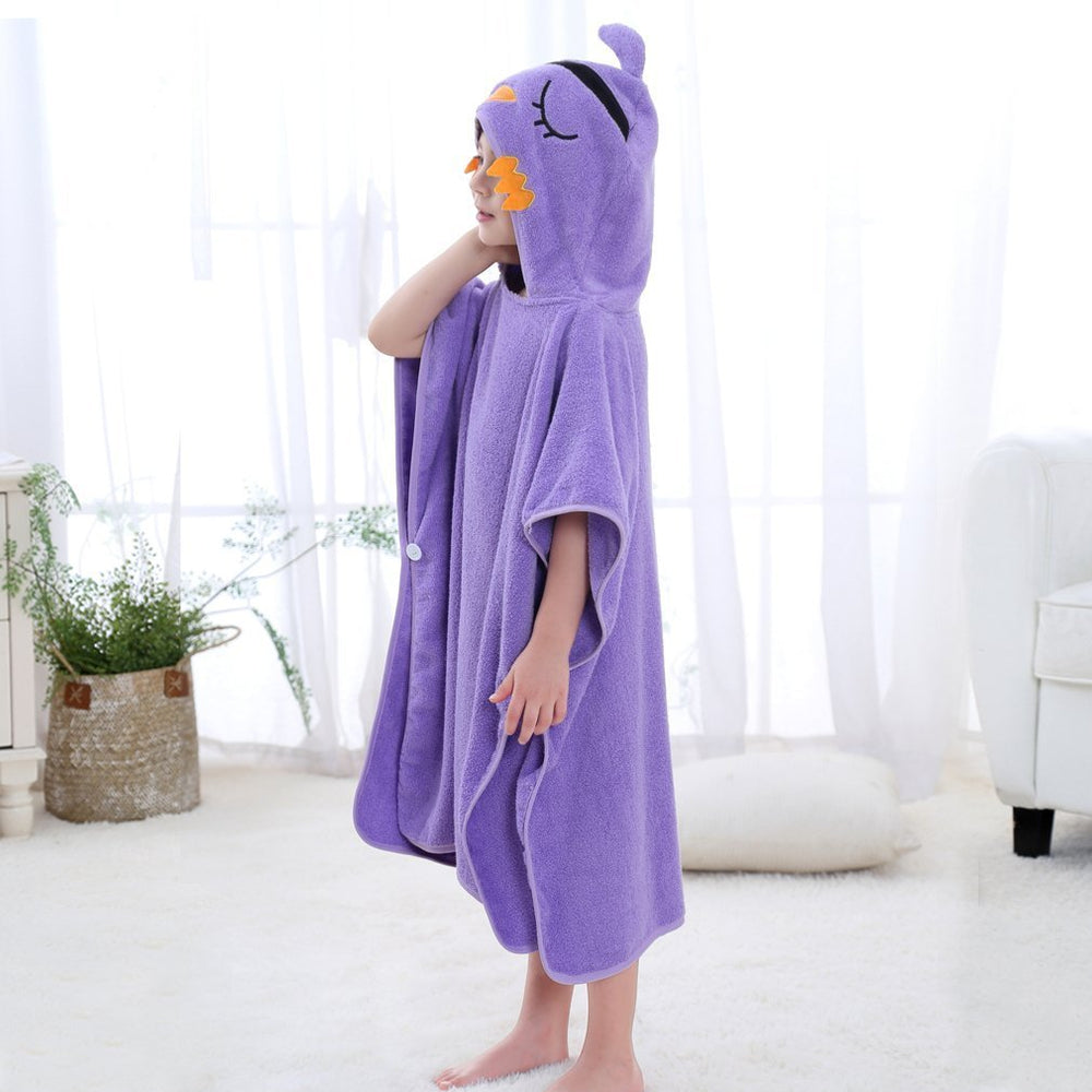 MICHLEY hooded towel doubles as a cozy wrap after beach play.