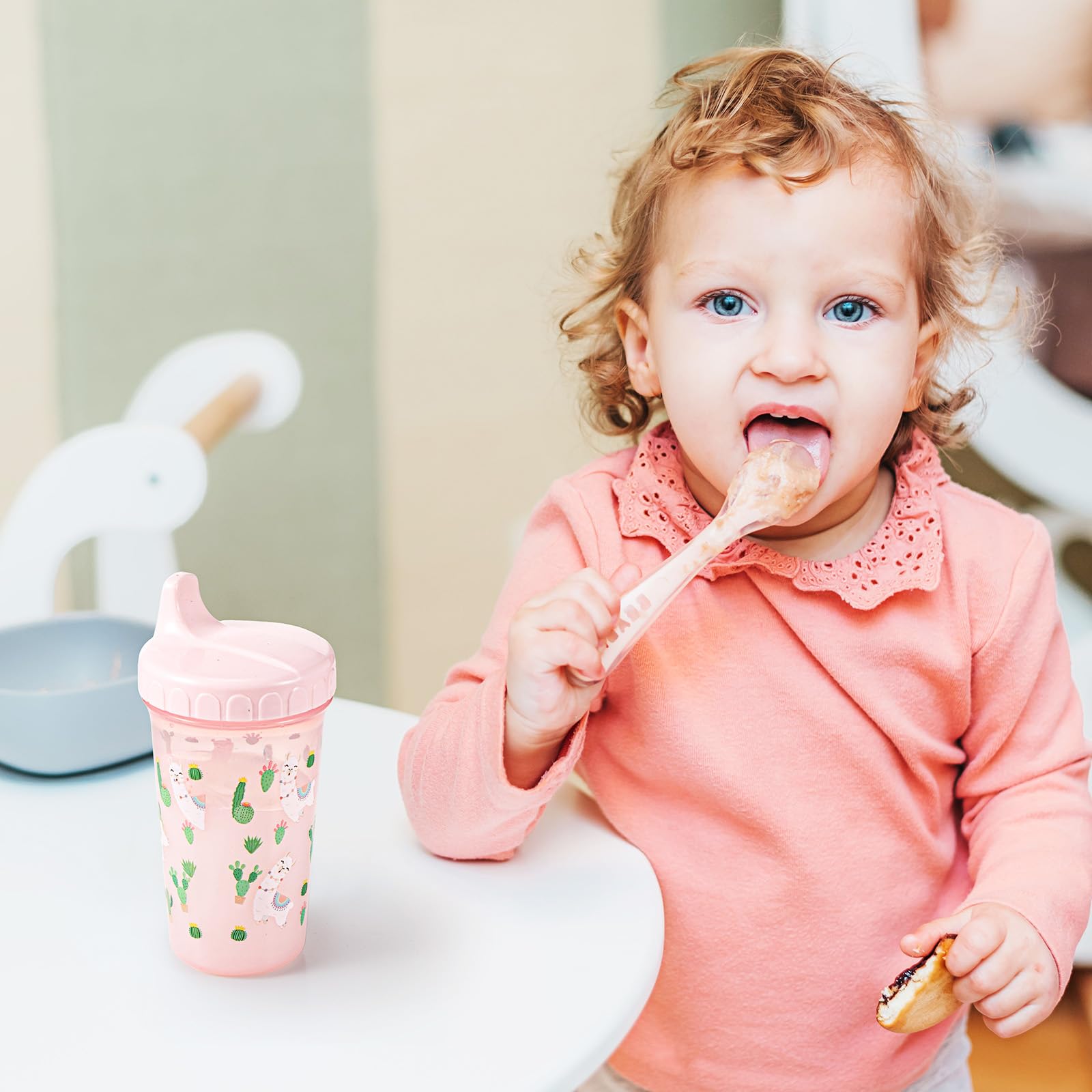 Mifoci lid-spill-proof sippy cup, reduces spills during mealtime.