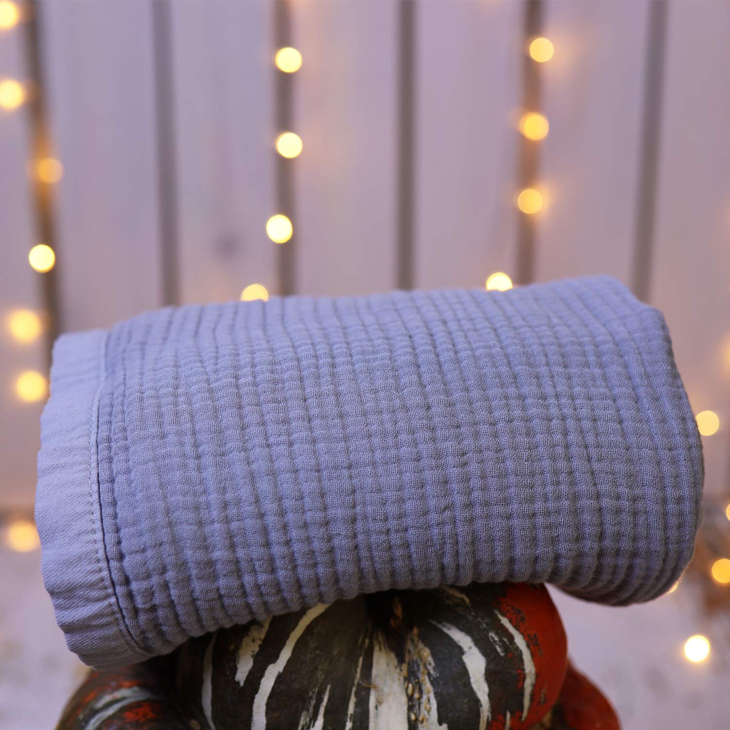 Migaloo easy-care blanket machine washes cold and softens over time.