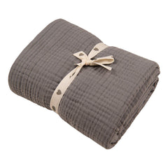 Migaloo Sharkskin Muslin Blanket with four layers folded for cozy swaddling.