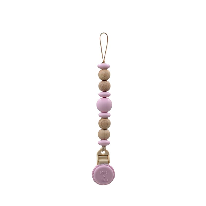 Mila & Lulu silicone pacifier clip in metal-free design keeps pacifier secure and clean.