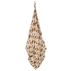Milkbarn Homestead swaddle fabric close-up showing soft breathable cotton for delicate skin