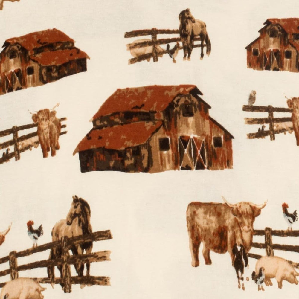Milkbarn Homestead swaddle wrapped newborn for secure sleep and cozy naps