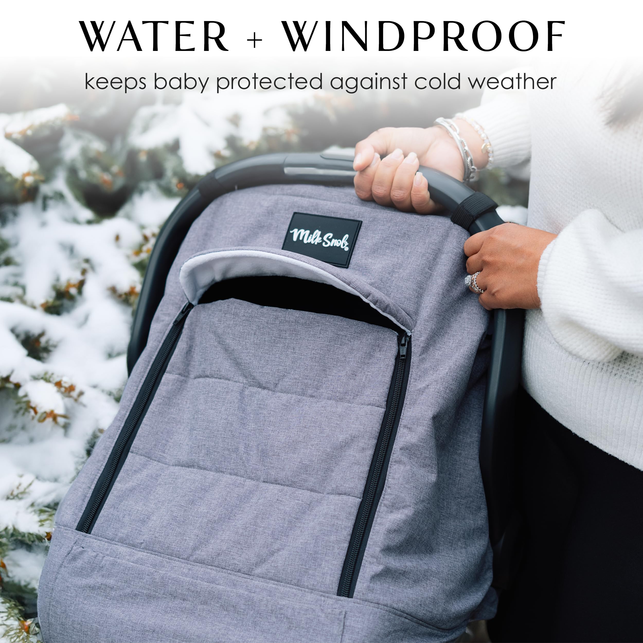 Milk Snob Winter Car Seat Cover bottom clasp secures the cover on car seats.