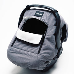 Milk Snob Winter Car Seat Cover canopy keeps baby warm and dry during outings.