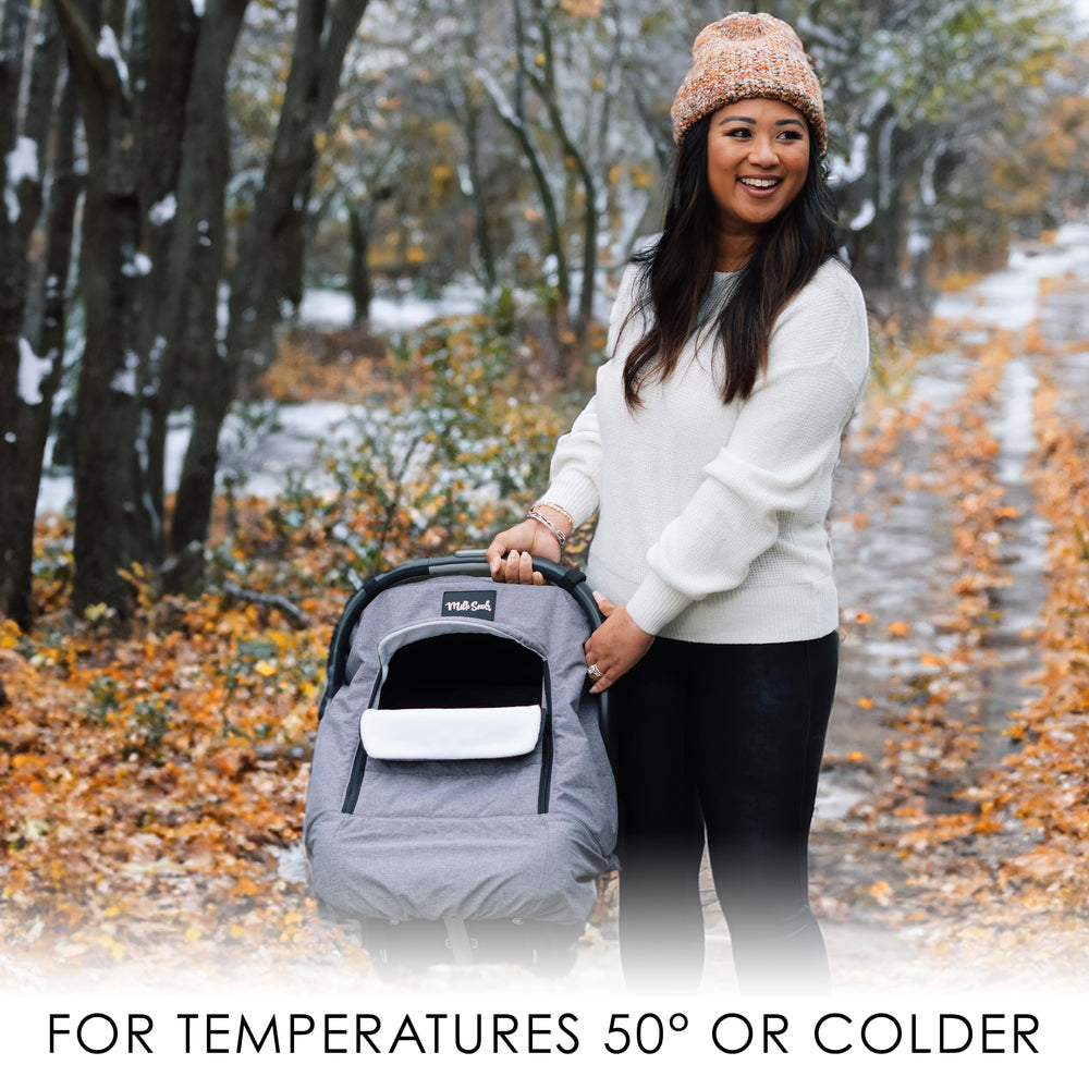 Milk Snob Winter Car Seat Cover waterproof outer fabric protects against wind and rain.