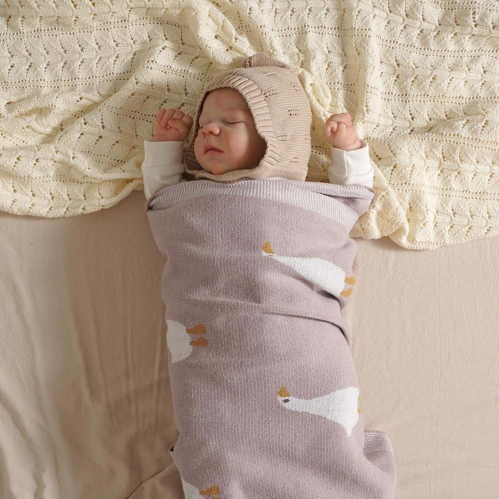 mimixiong swaddle-ready blanket showing versatile wrap options for newborns