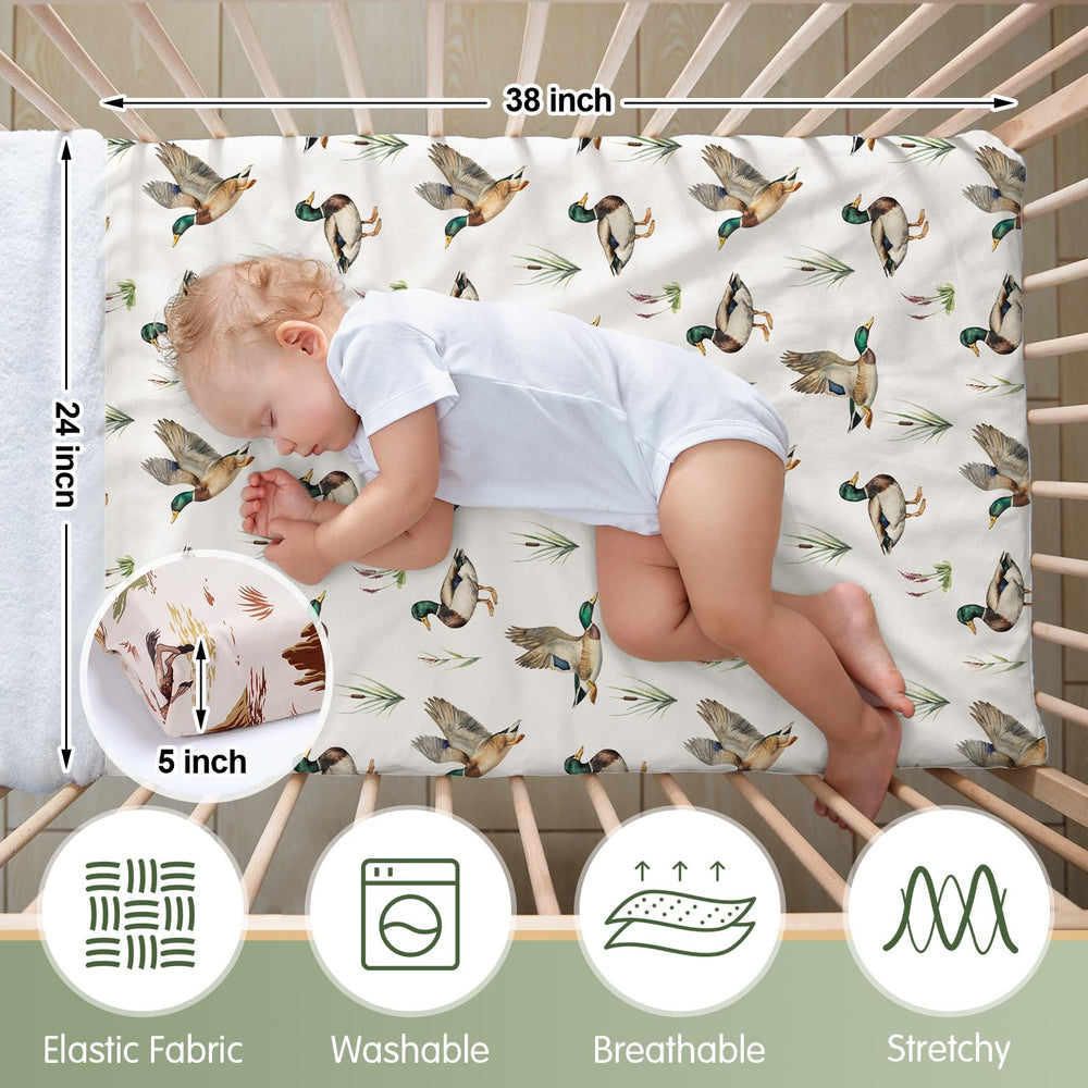 Mindsoft Mallard Duck crib sheets in a mini crib showing a playful nursery accent