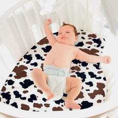 Mindsoft Western Cowboy crib sheet closeup highlights soft, durable polyester fabric.