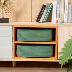 MiniArk green basket used for bathroom organization on a shelf
