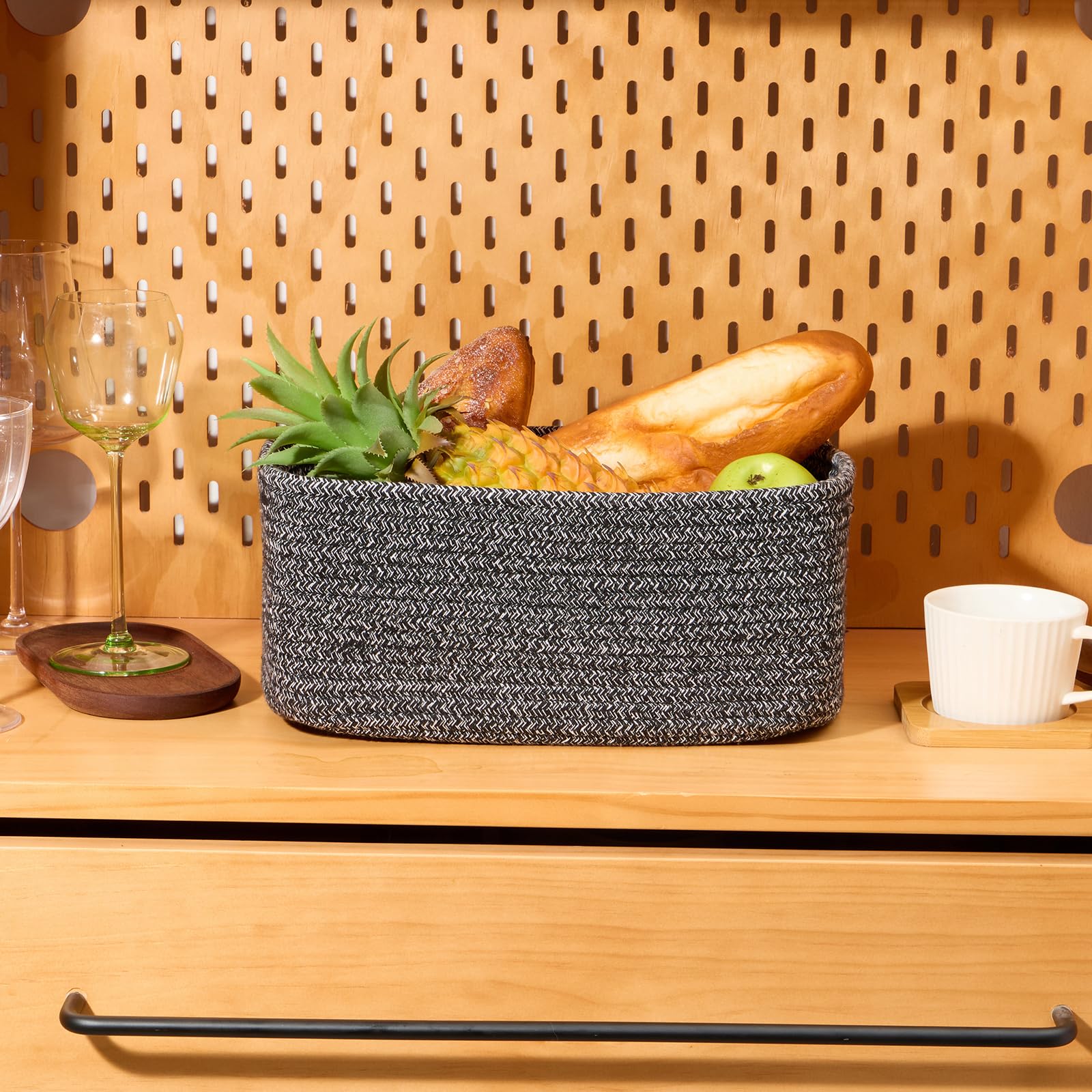 MiniArk baskets help tidy towels and small accessories in closets.