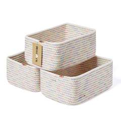 MiniArk small storage baskets organize cosmetics and accessories on a dresser.