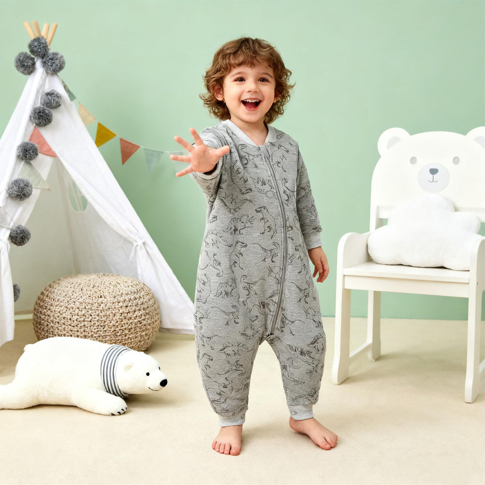 Minicoco footie-design blanket keeps arms and feet cozy.