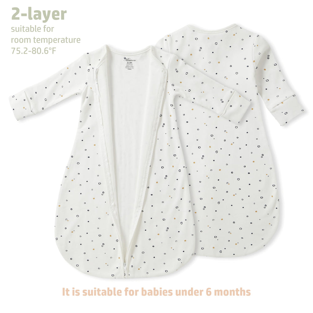 Minicoco wearable blanket long sleeves keeps tiny arms warm during night sleep.