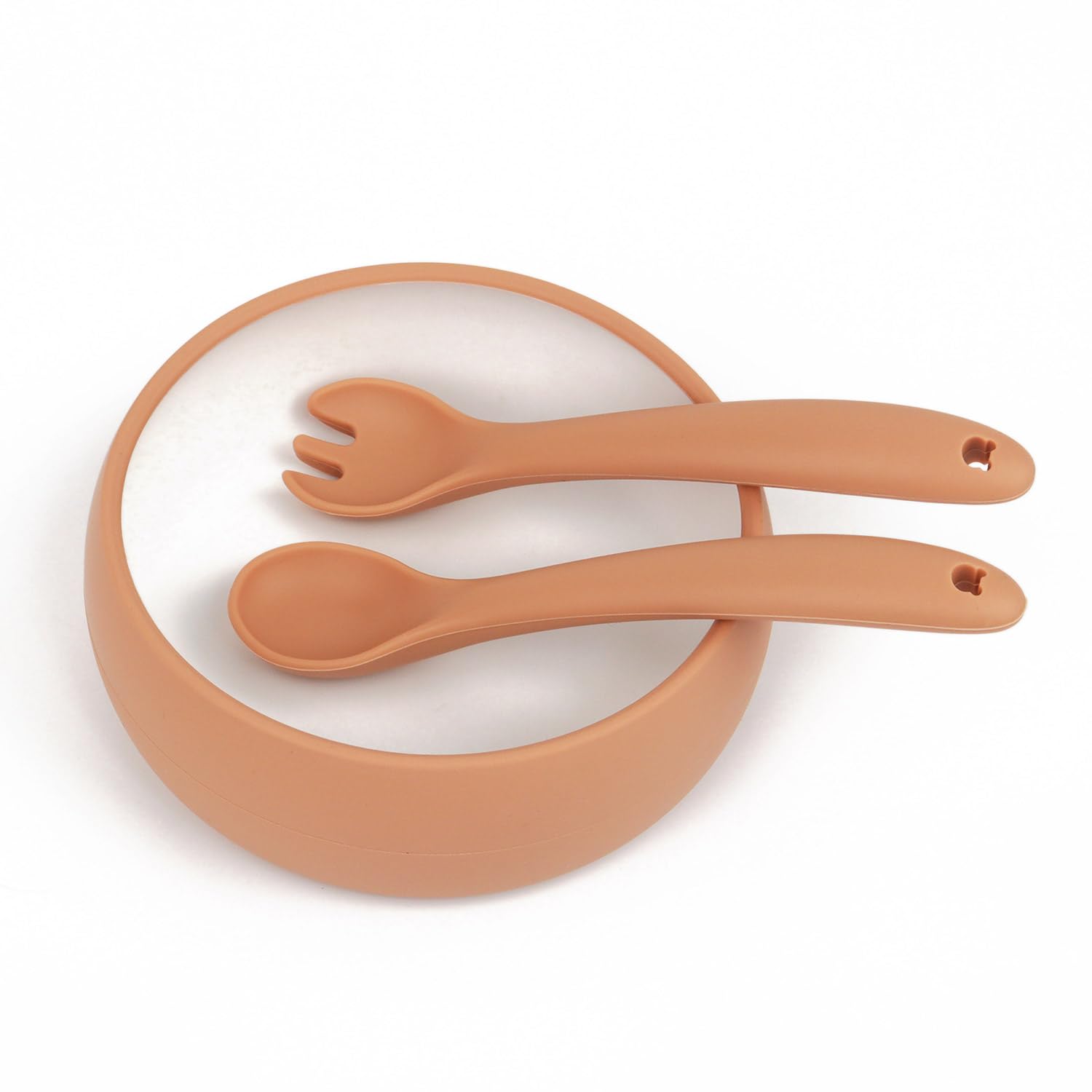 Miniguysa silicone utensils designed for tiny hands encourage independent eating.