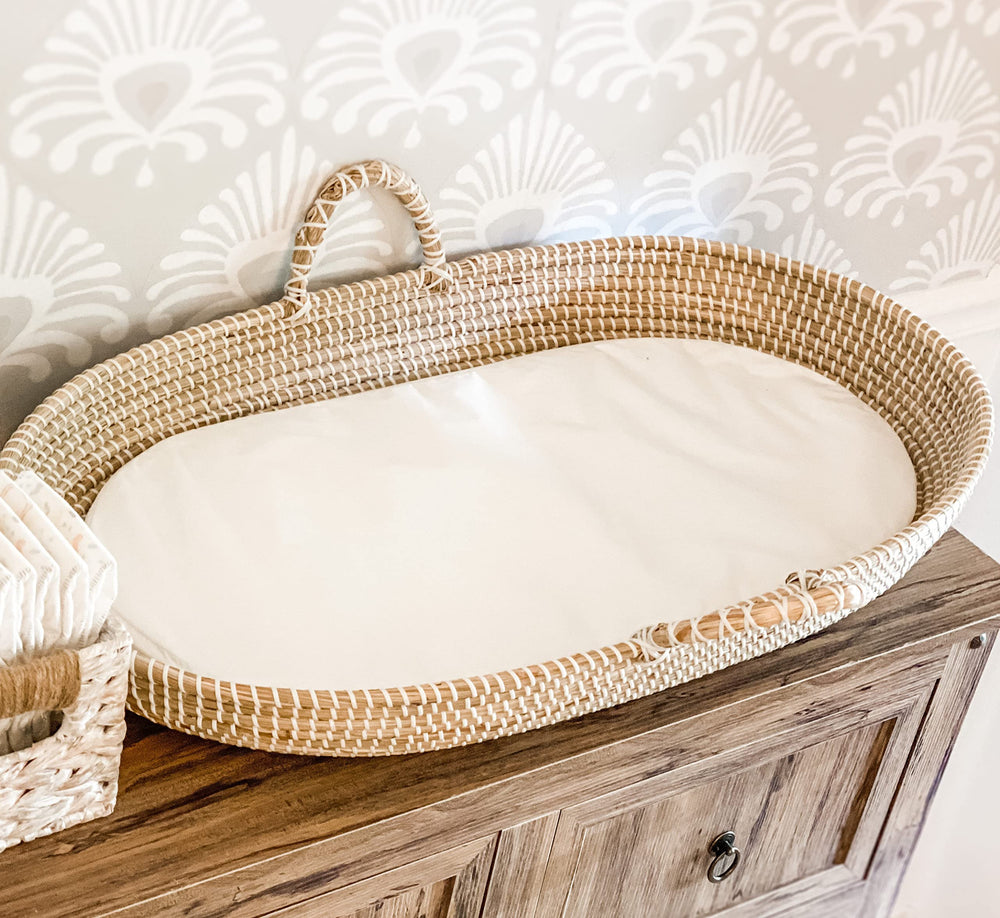 MiniMoose Seagrass changing basket close-up with cushion for safe diaper changes.
