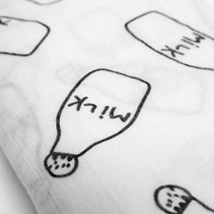 Minination bamboo muslin swaddle being used for breathable everyday comfort.