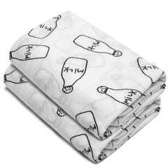 Minination bamboo muslin swaddle close-up showing breathable texture.