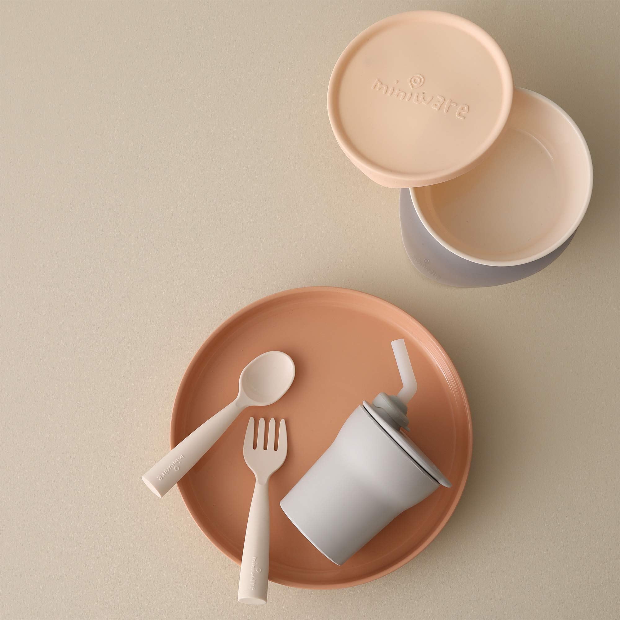 Miniware Little Foodie sip cup with detachable foot supports steady sipping and reduces spills.