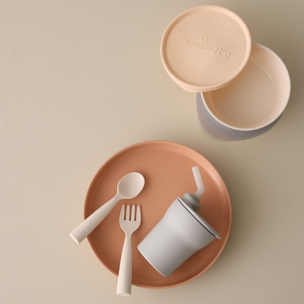 Miniware Little Foodie sip cup with detachable foot supports steady sipping and reduces spills.