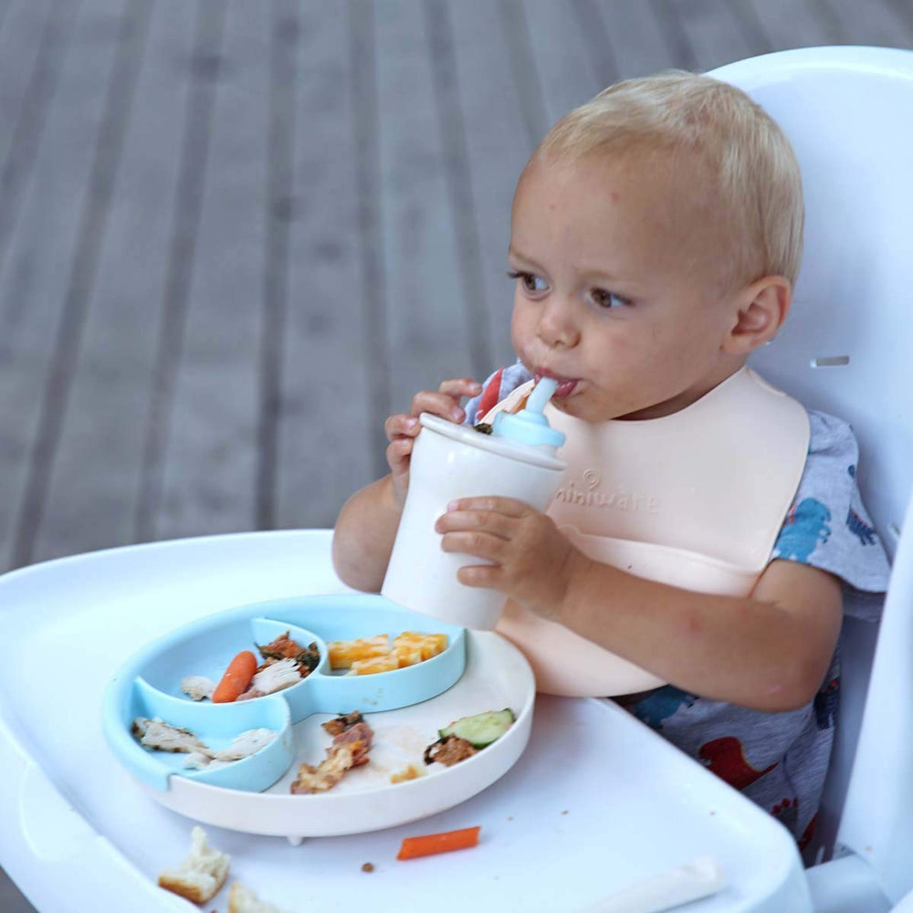 Miniware bib reduces mess during meals at home or on the go.