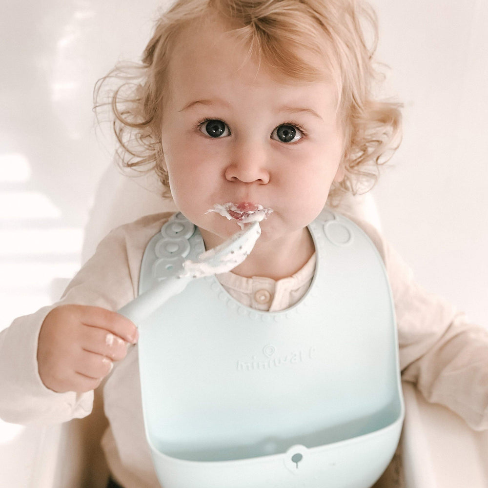 Miniware First Bites Deluxe set displayed on table for eco-friendly dining
