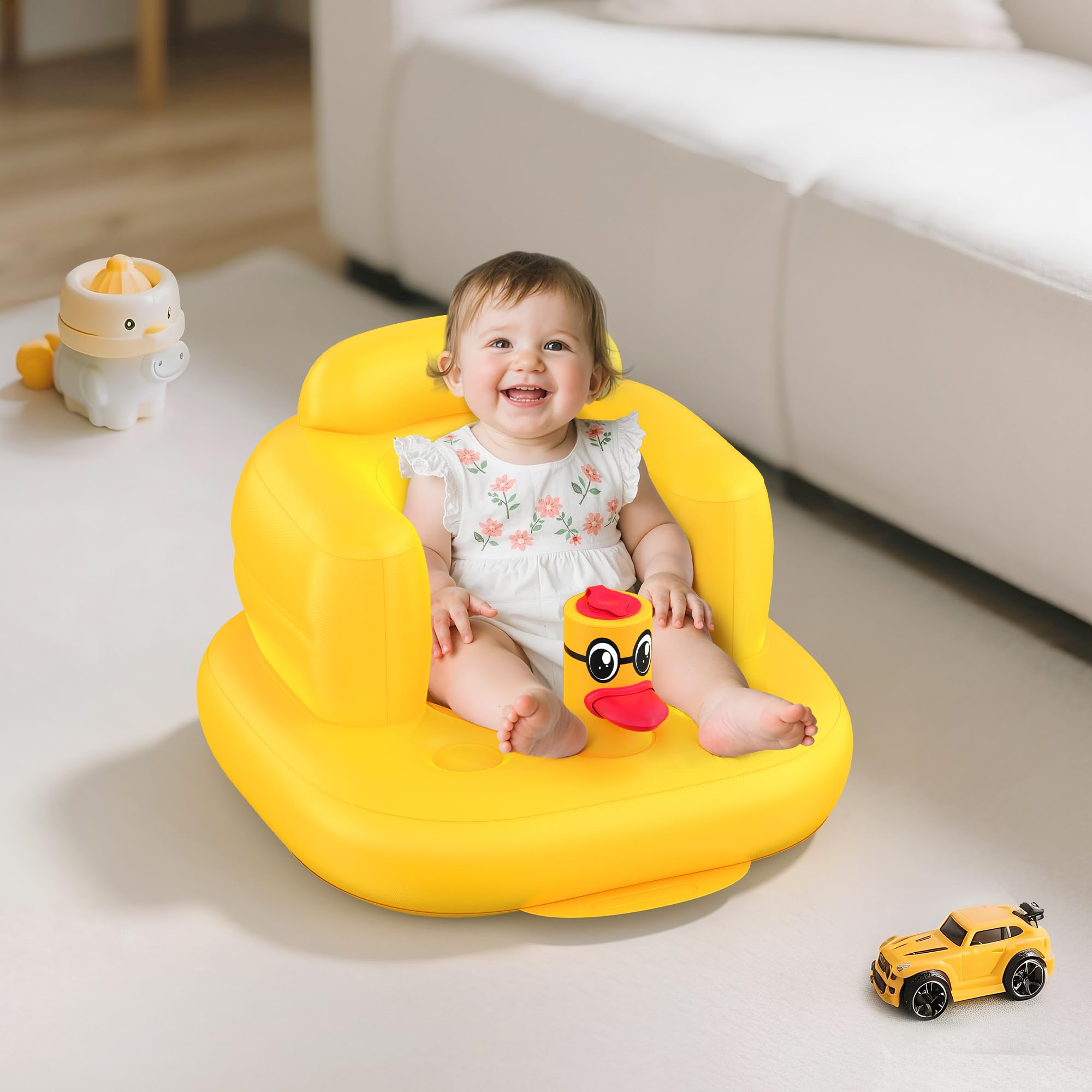 Mink inflatable seat side view shows ergonomic wraparound support for growing babies