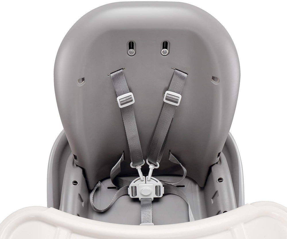 Minne high chair harness in use at mealtime, promoting stable seating.