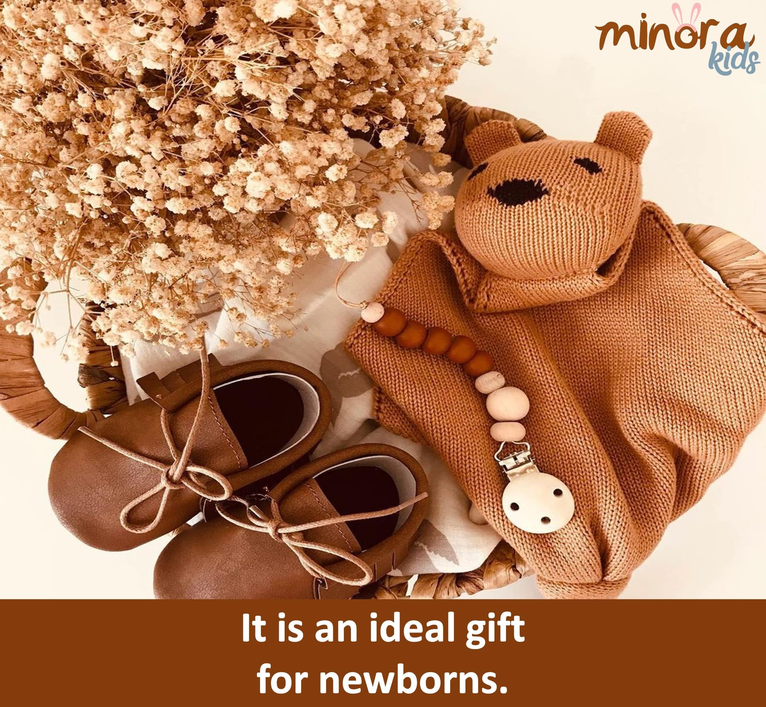 Minora complete-package set showcases cocoon, teddy, and pacifier holder