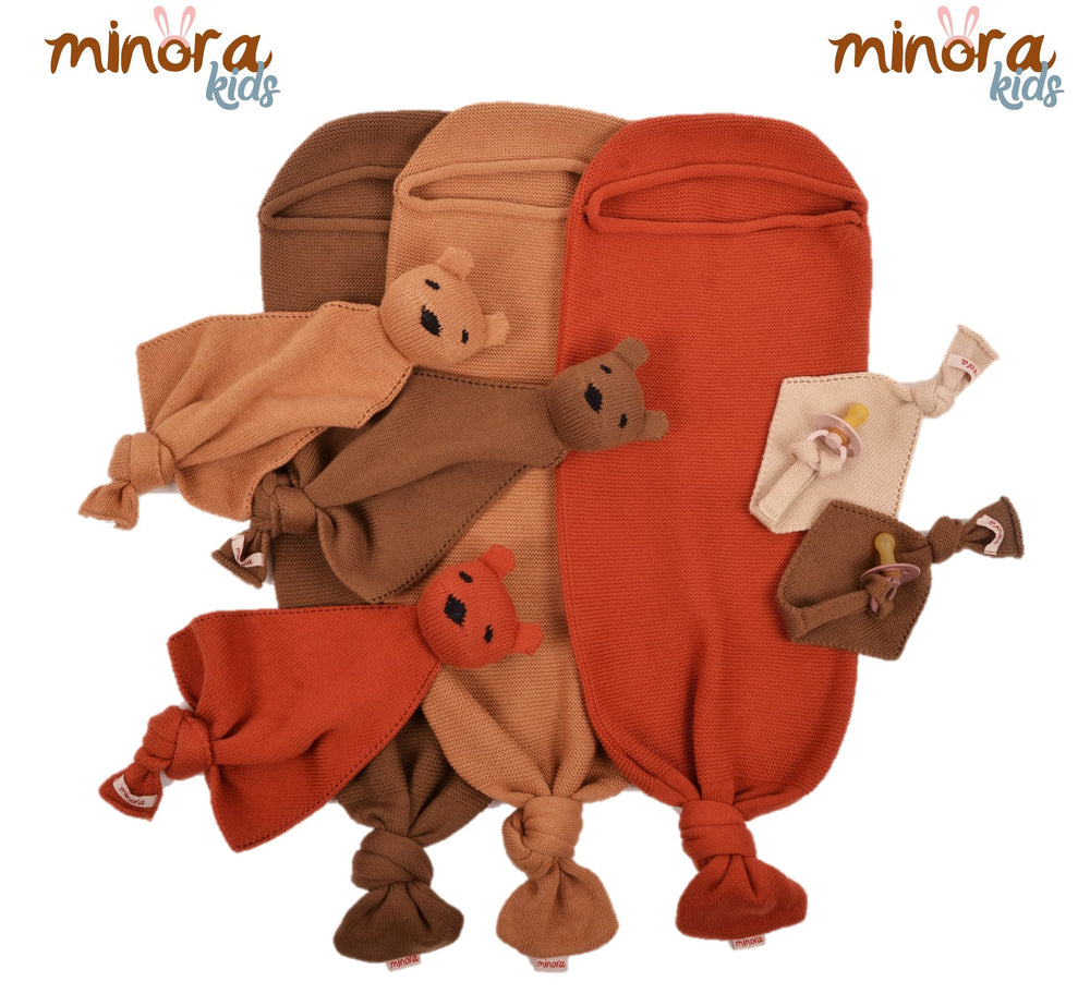 Minora cocoon swaddle sleep sack demonstrates secure, womb-like sleep support