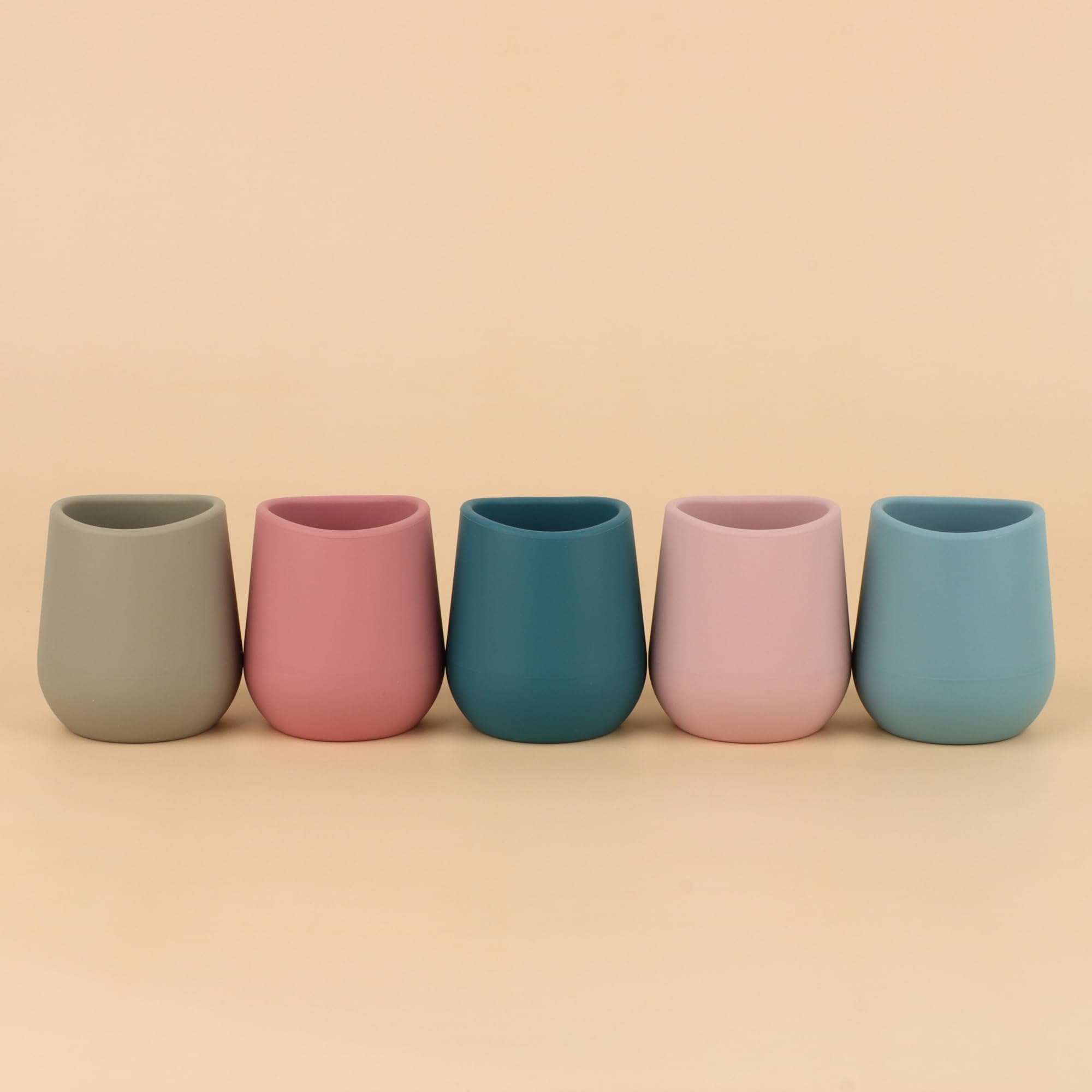 Mintlyfe soft grip handle silicone cup for baby-led feeding sessions.