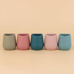 Mintlyfe soft grip handle silicone cup for baby-led feeding sessions.