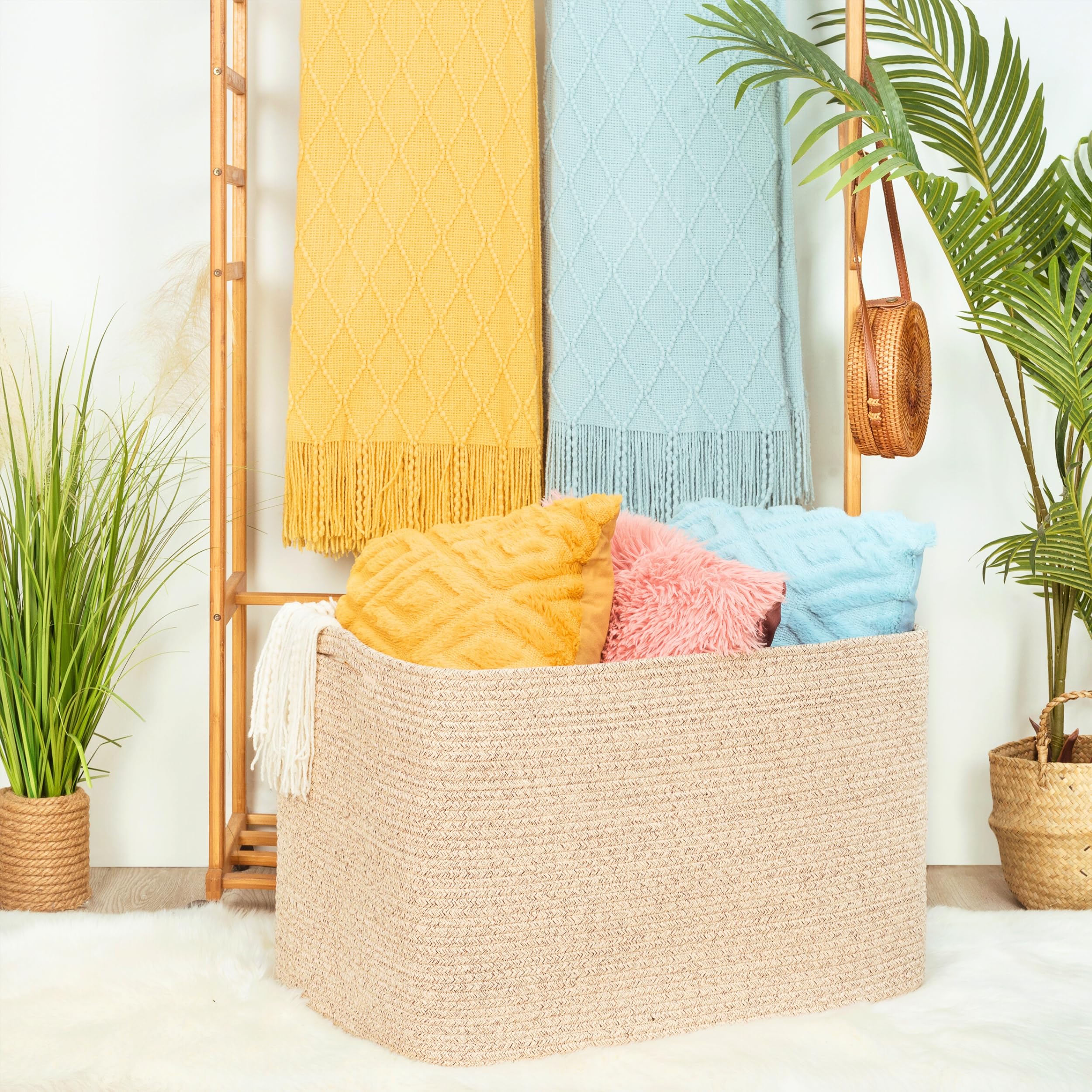 MINTWOOD 112L basket in living room decor complements any style while organizing throws.
