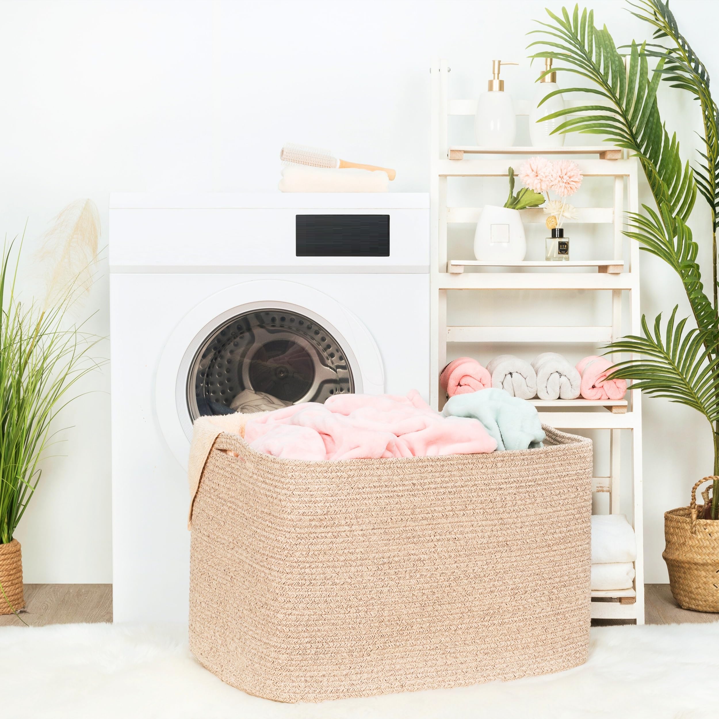 MINTWOOD 112L basket used as towel storage in bathroom or utility spaces.