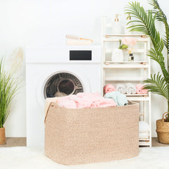 MINTWOOD 112L basket used as towel storage in bathroom or utility spaces.