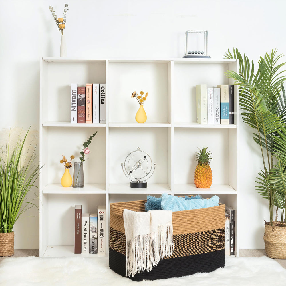 Mintwood basket with durable handles enables easy room-to-room transport.
