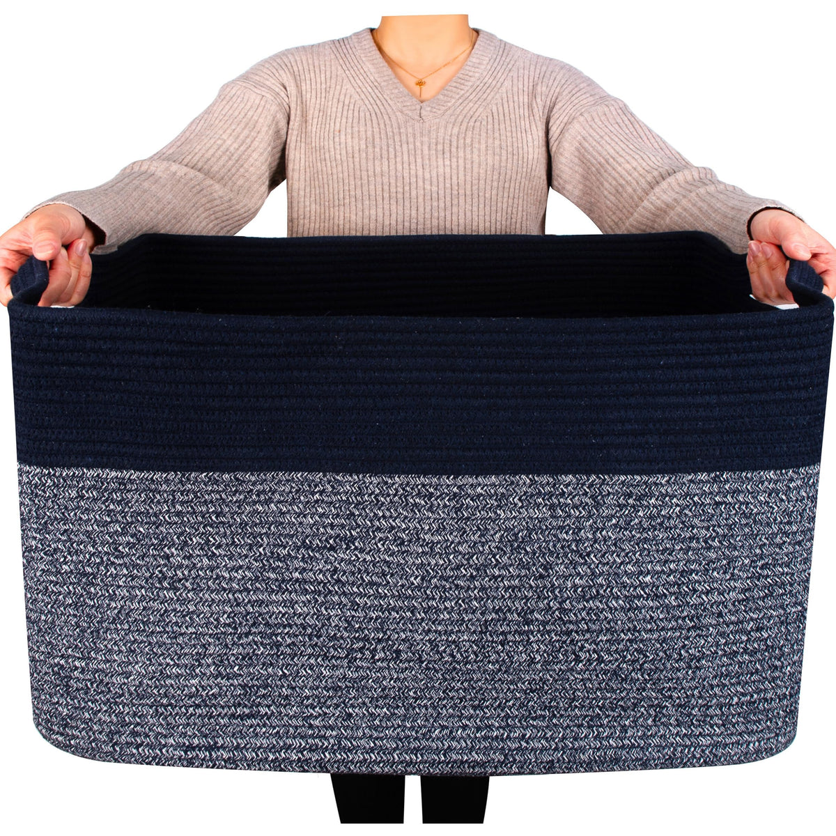 Mintwood Design 22in rectangle rope basket holds blankets for tidy living room storage.