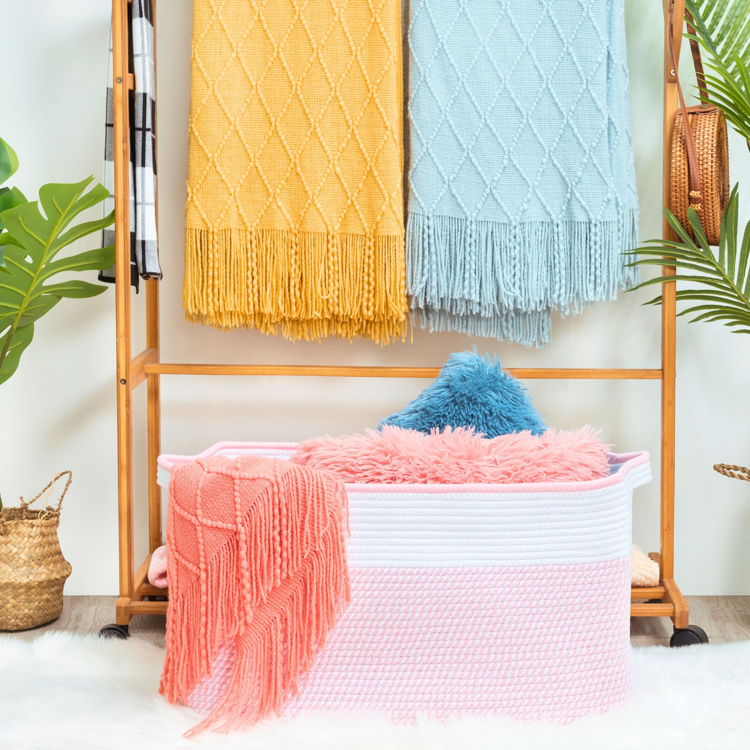 MINTWOOD Design rectangle rope storage basket with handles in a living room setup.